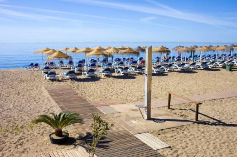 Spain's beach showers could be drying up for good... and not everyone minds